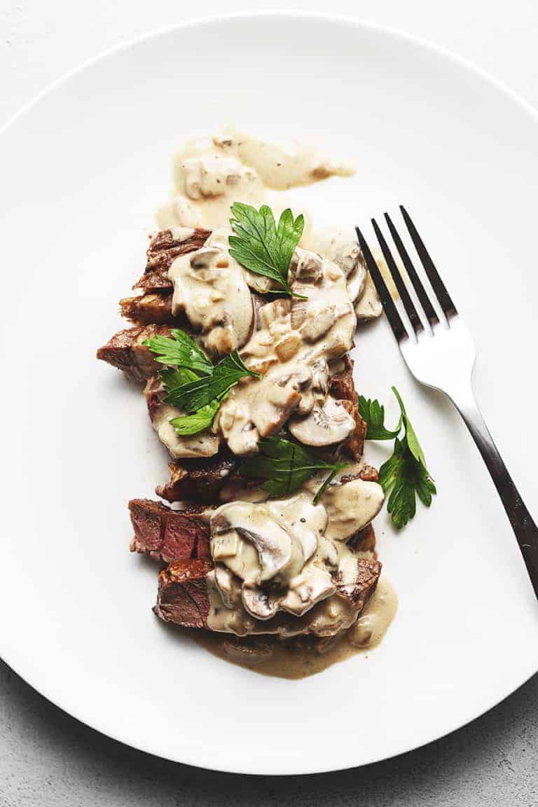 steak diane on a while platter