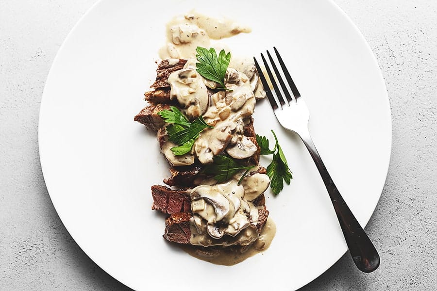 steak diane on a while platter