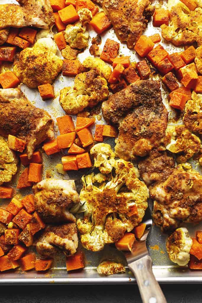 chicken thighs and veggies on a sheet pan