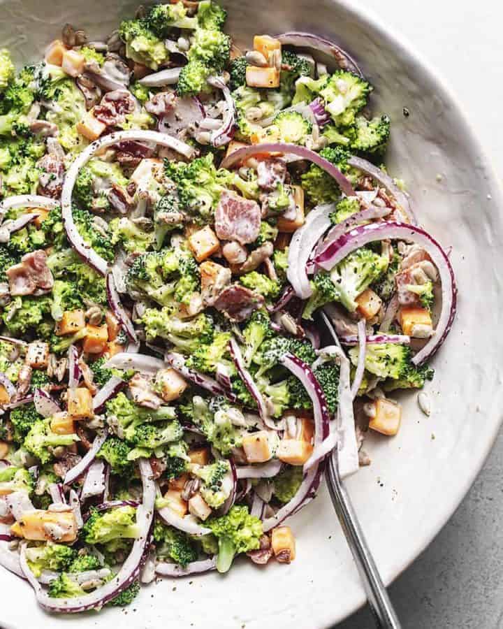 broccoli salad with bacon in a gray bowl