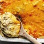 baked chicken spaghetti with squash in a while casserole dish