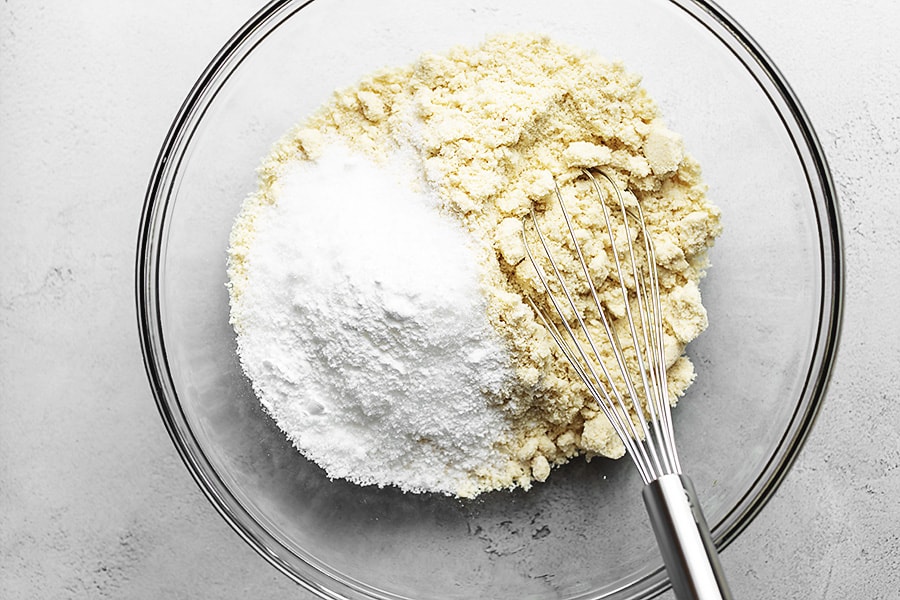 almond flour, baking soda, salt and sweetener in a glass bowl