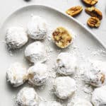 keto snowball cookies on a white platter