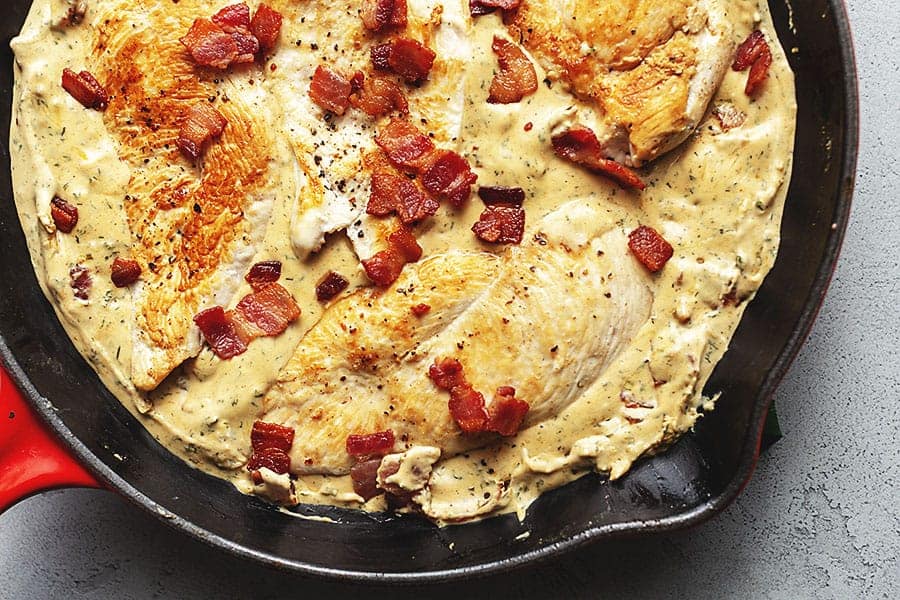 CHEESY RANCH CHICKEN IN A RED SKILLET
