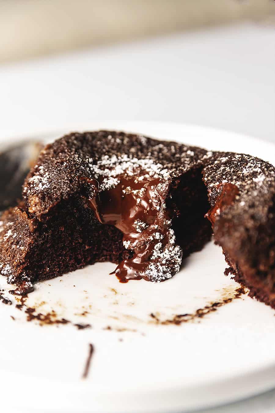 keto chocolate lava cake on a white plate
