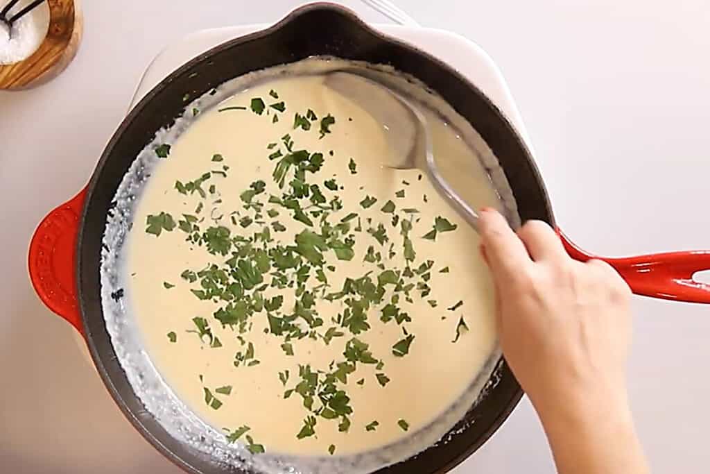 creamy lemon garlic sauce in a skillet