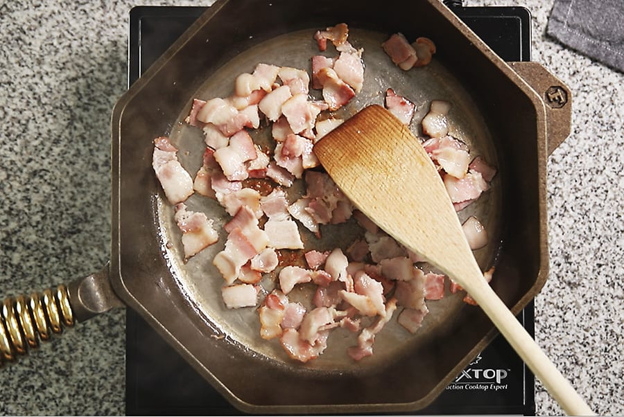 bacon in a skillet over medium heat