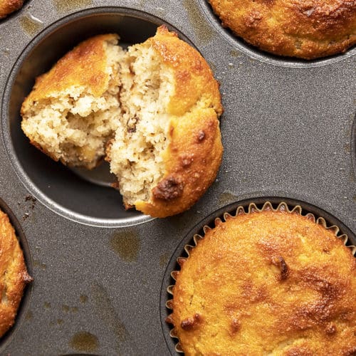 banana bread muffins in a muffin tin