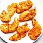 chicken tenders on a white plate