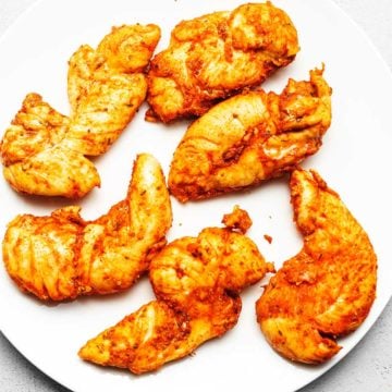 chicken tenders on a white plate