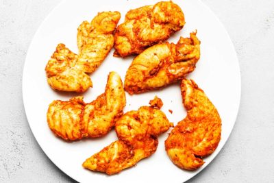 chicken tenders on a white plate