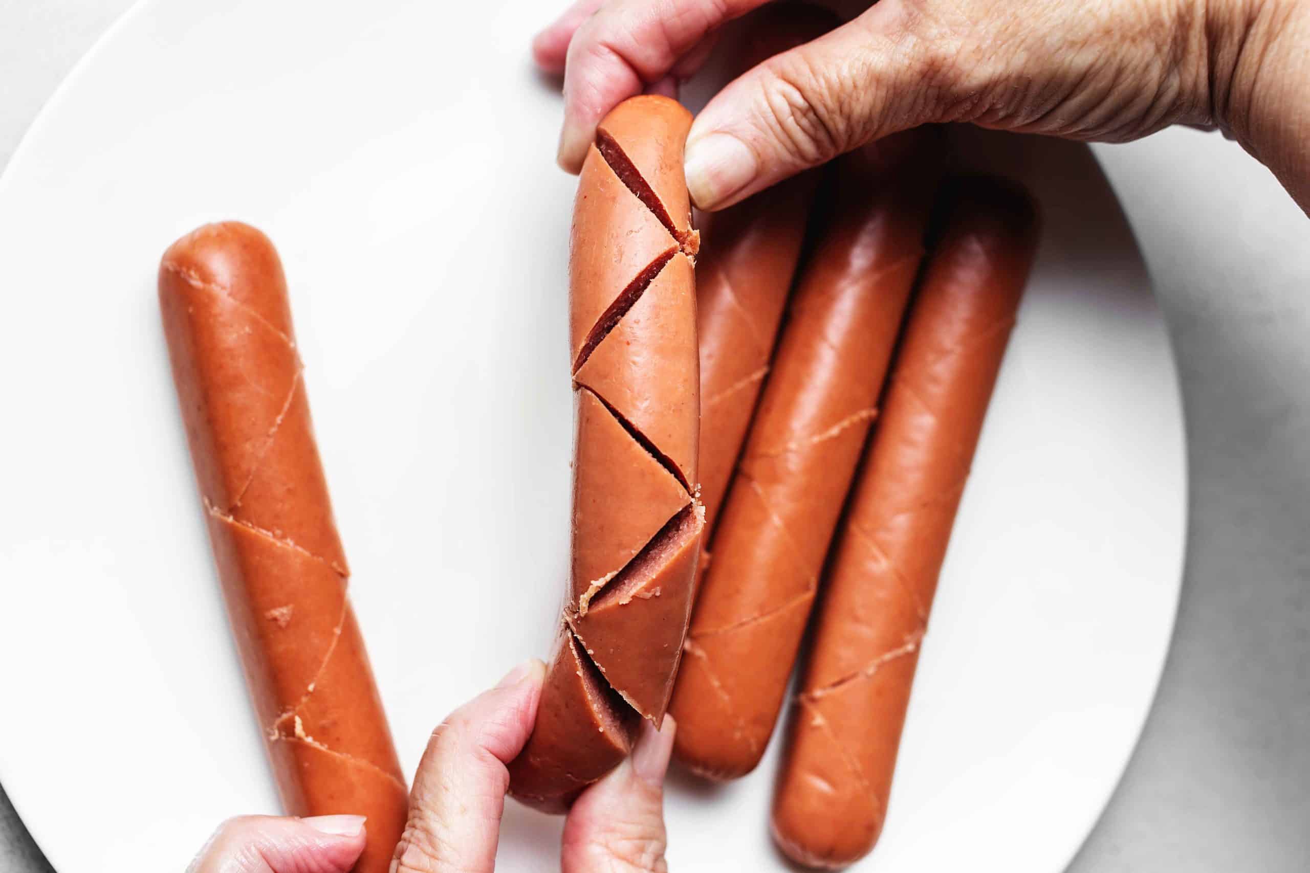 cutting hot dogs