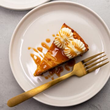 a piece of pumpkin cheesecake on a plate
