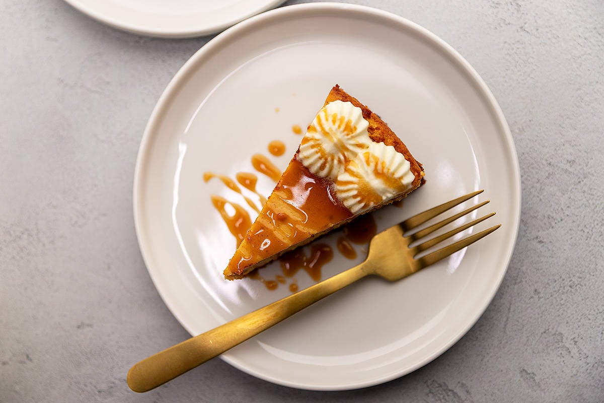 a piece of pumpkin cheesecake on a plate
