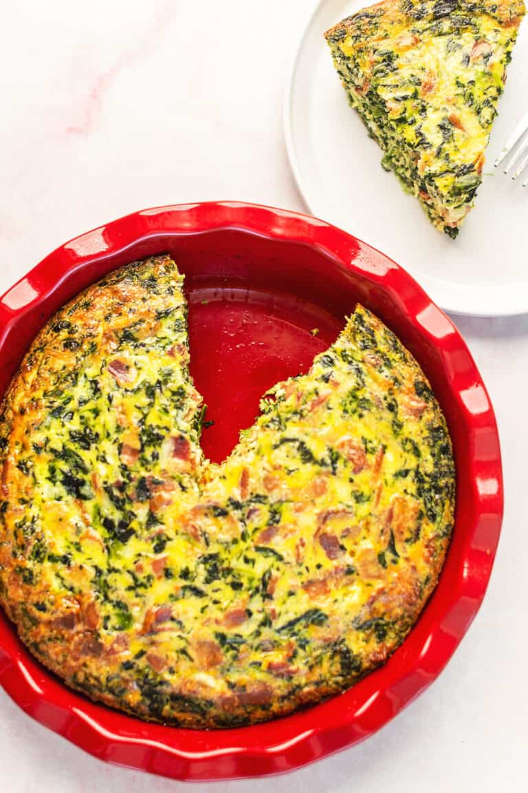 crustless quiche in a red pie plate