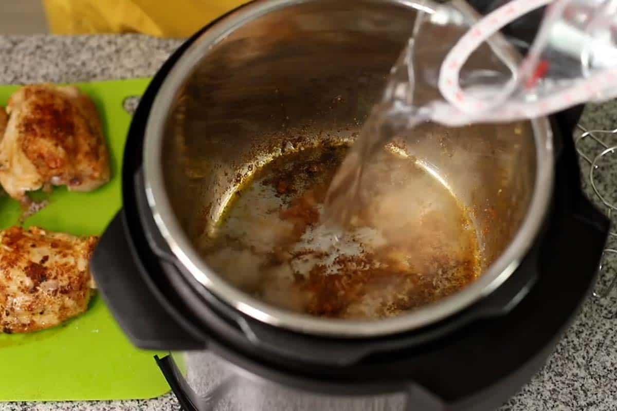 pouring water into the instant pot