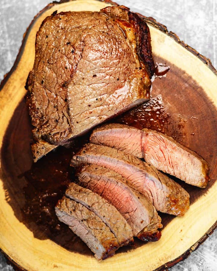 air fryer steak on a wood cutting board