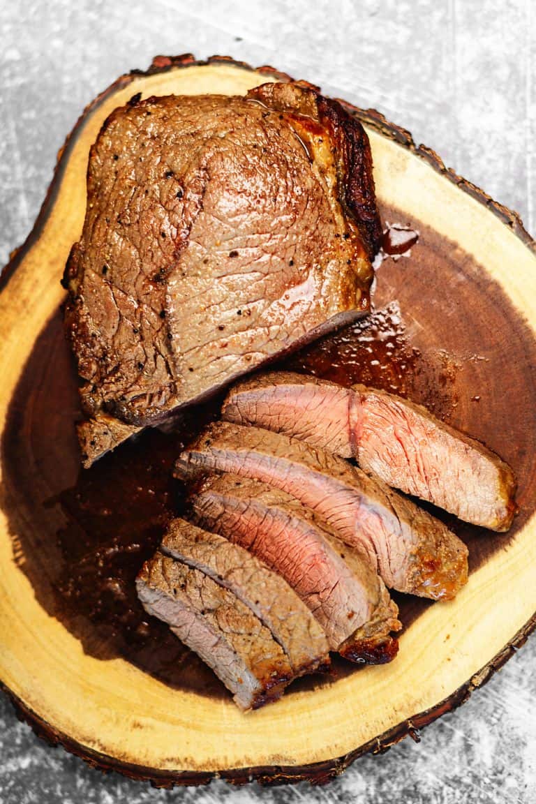 air fryer steak on a wood cutting board
