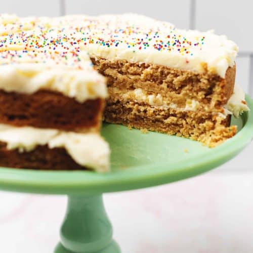 keto birthday cake on a stand
