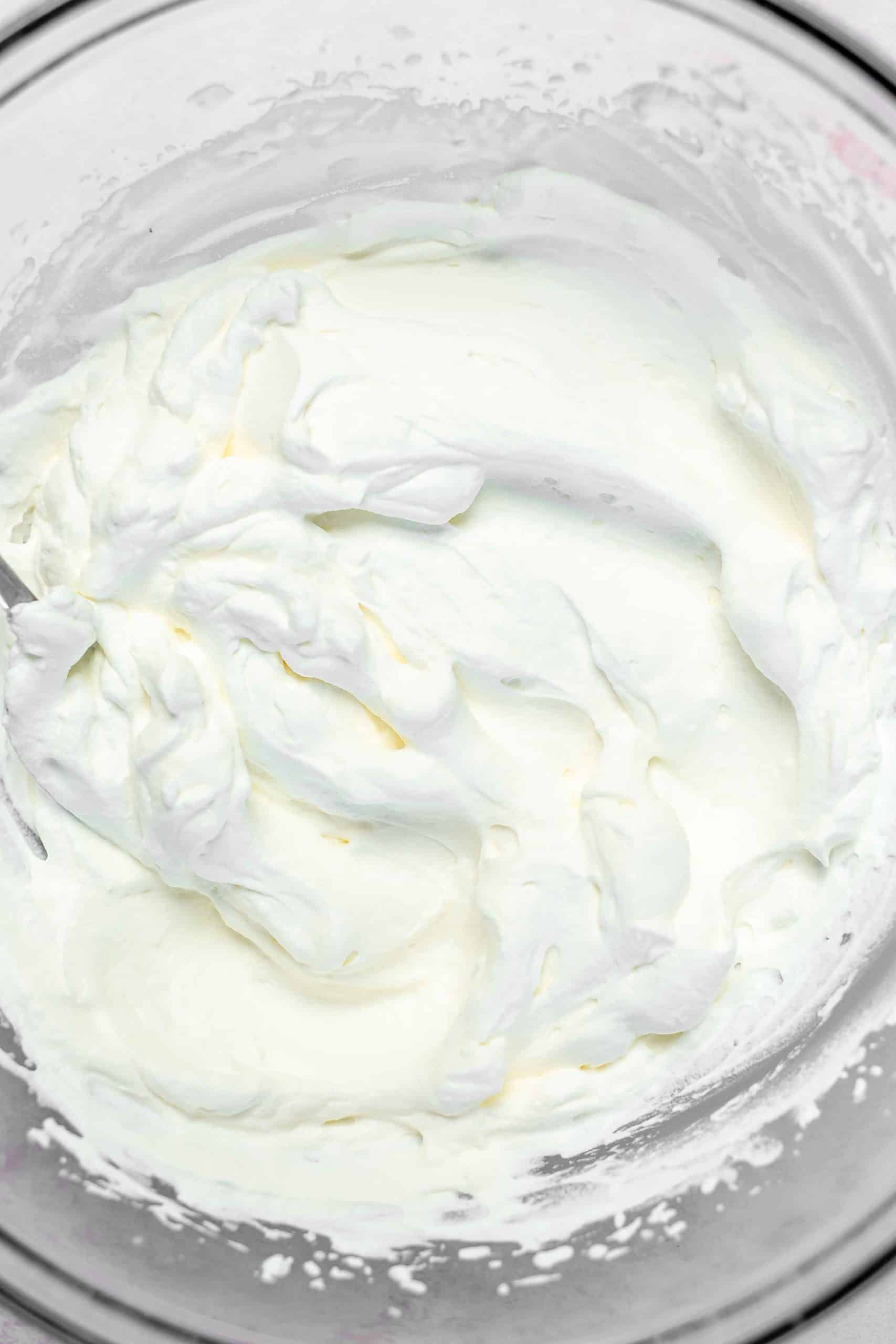 whipped cream in a glass bowl