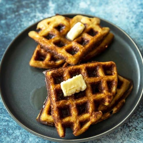 a big plate of waffles