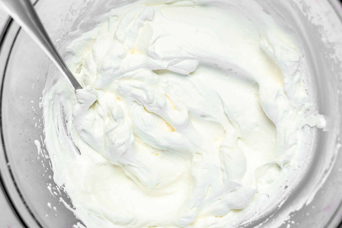 fluffy low carb whipped cream in a glass bowl