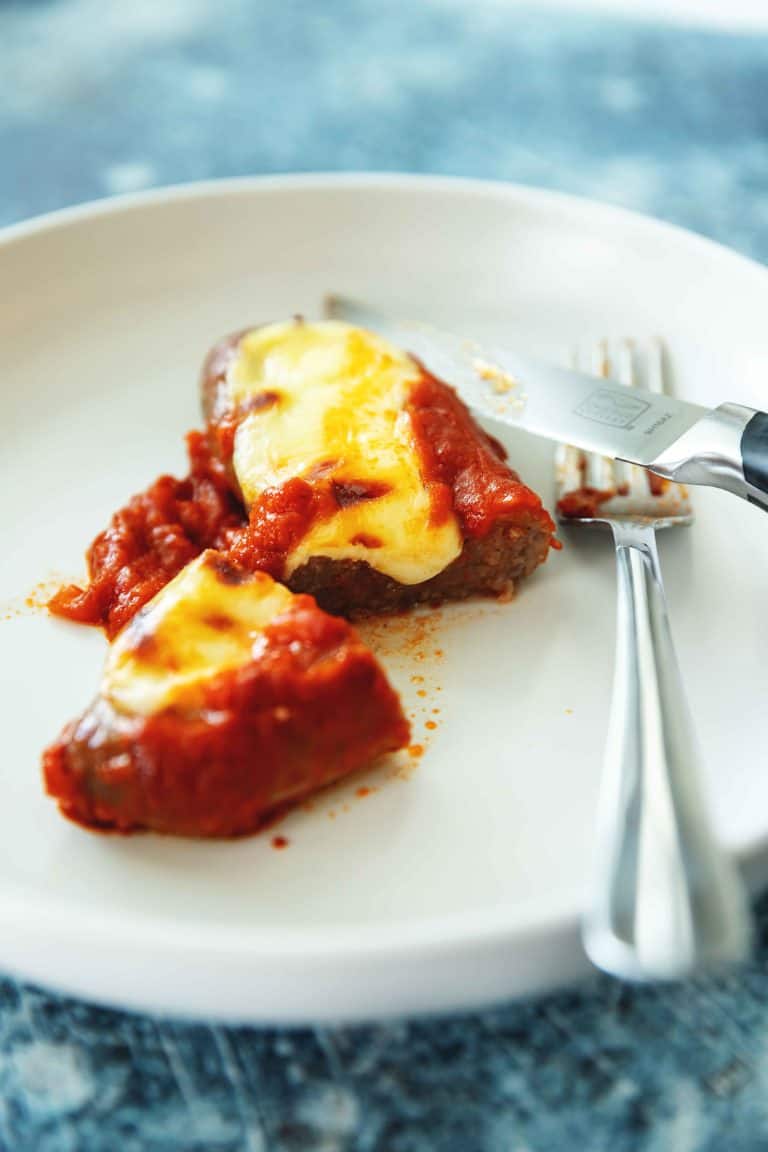 Stuffed sausage on a white plate