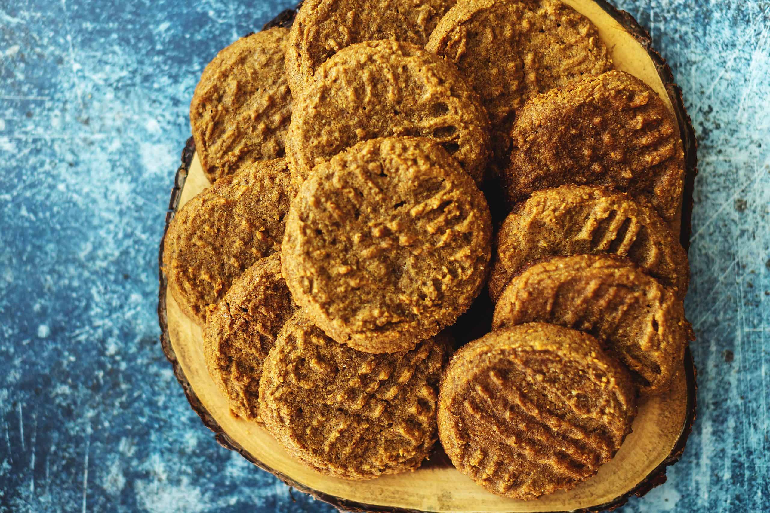 almond butter cookies on a wooded tray