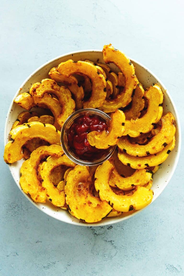 delicata squash fries in a bowl with ketchup