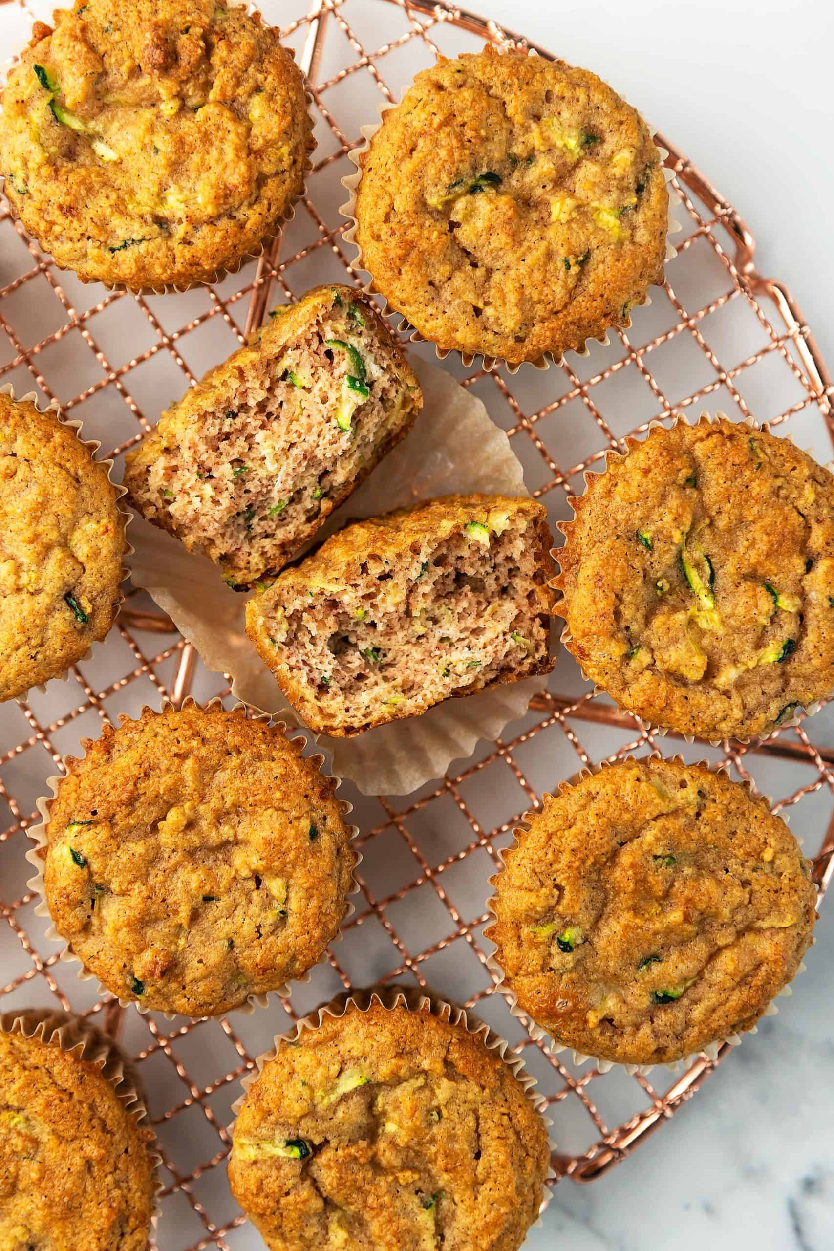 zucchini spice muffins on a cooling rack