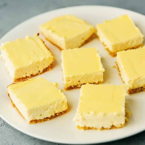 keto cheesecake bars on a white plate