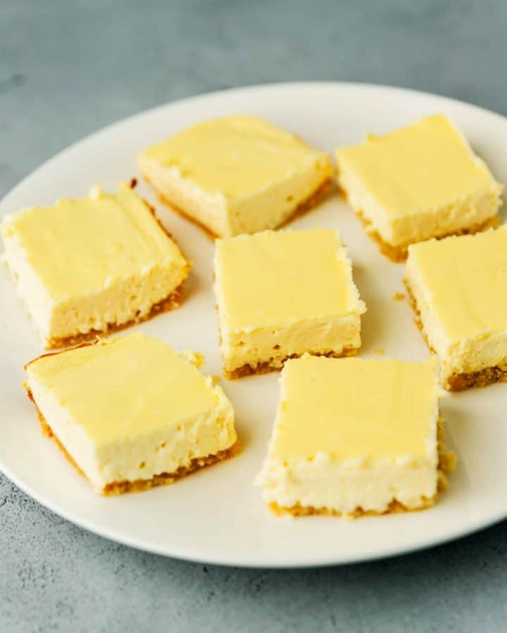 keto cheesecake bars on a white plate