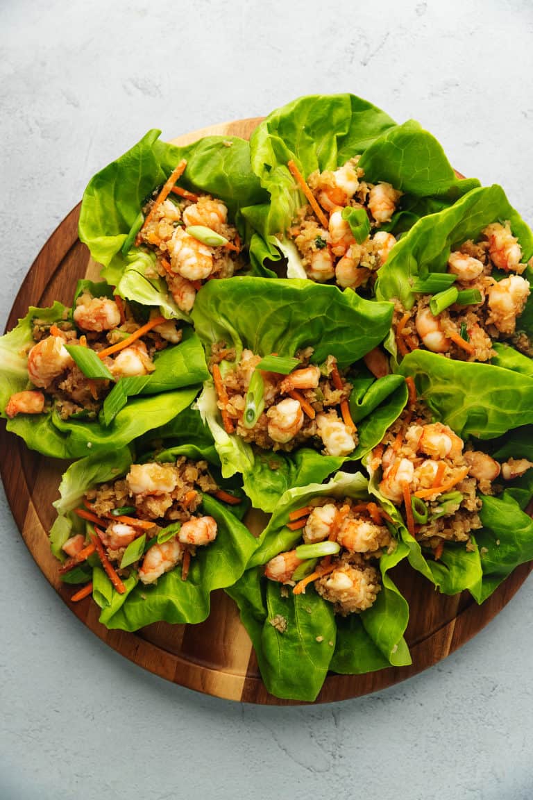 keto shrimp lettuce wraps on a wood board