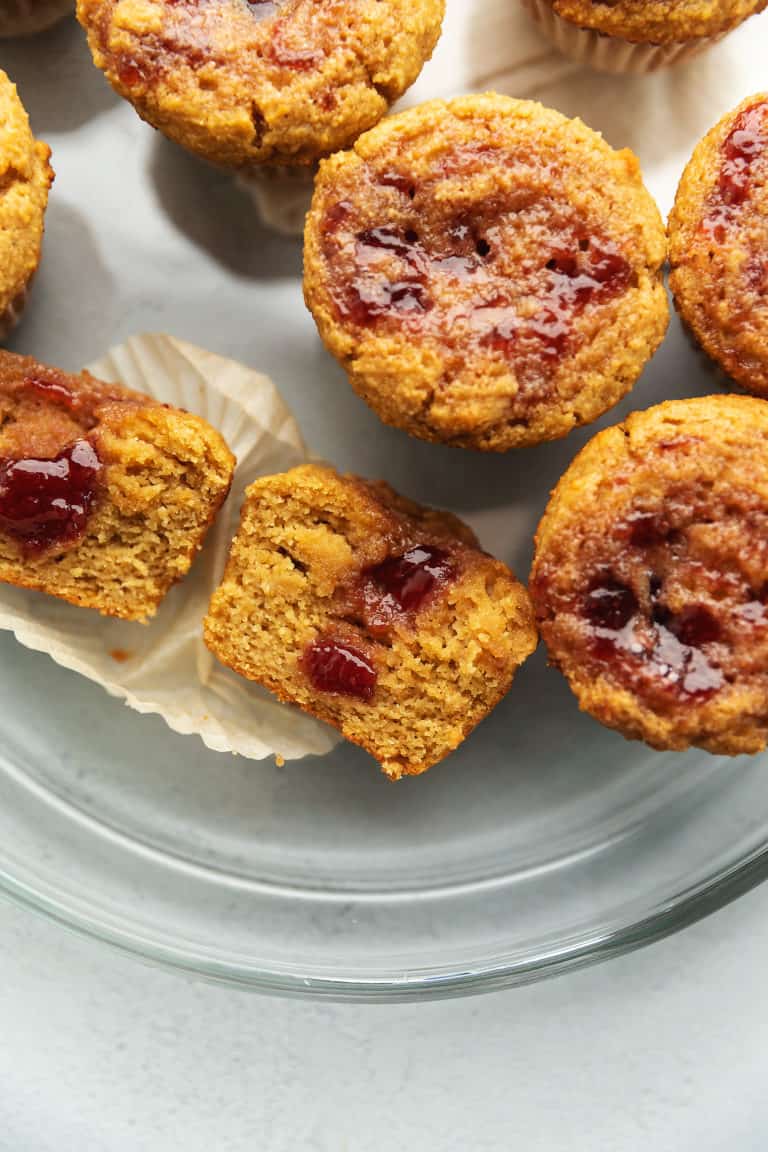 keto pb&j muffins on a glass plate