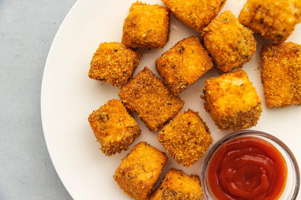 air fryer salmon nuggets on a white plate