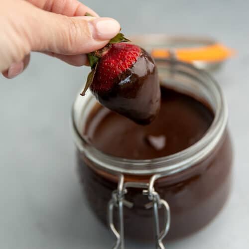 strawberry dipped in keto hot fudge sauce