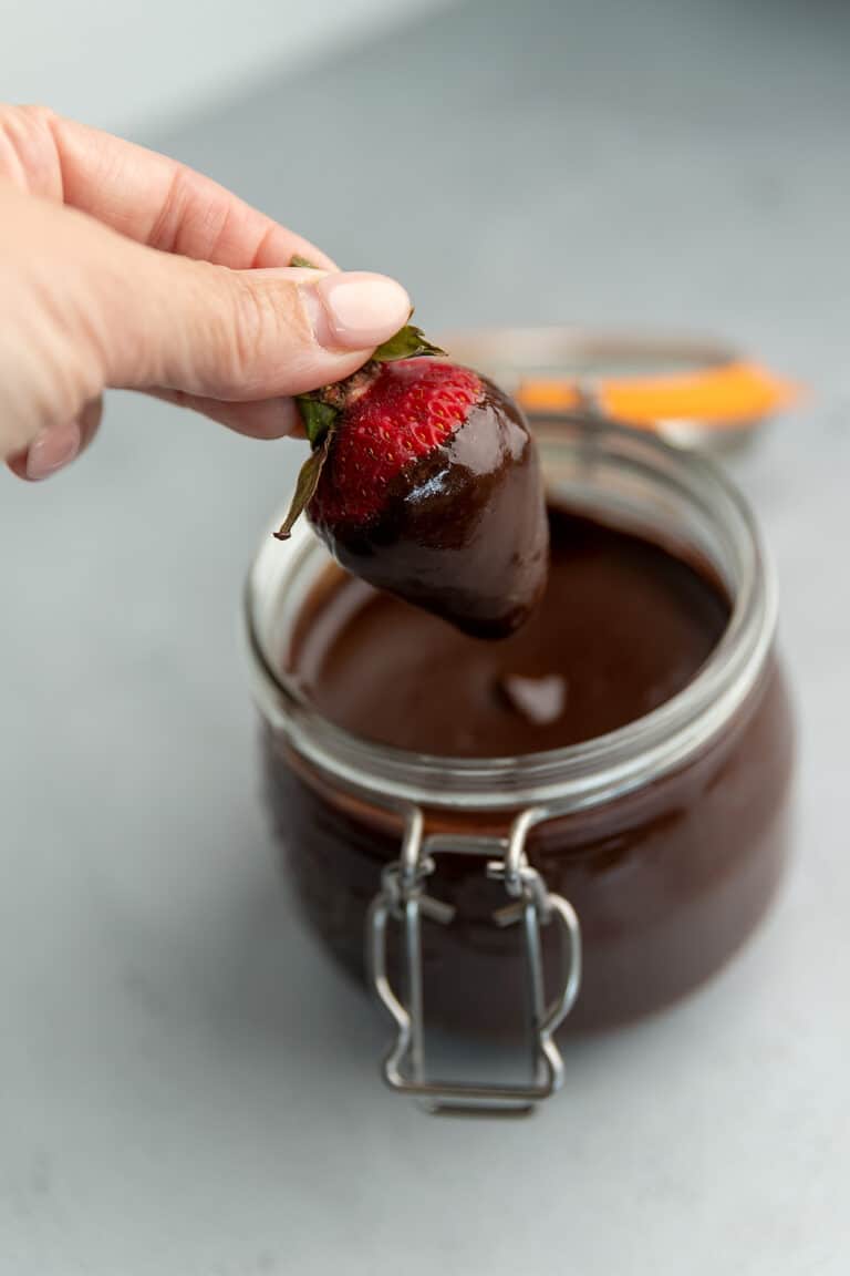 strawberry dipped in keto hot fudge sauce
