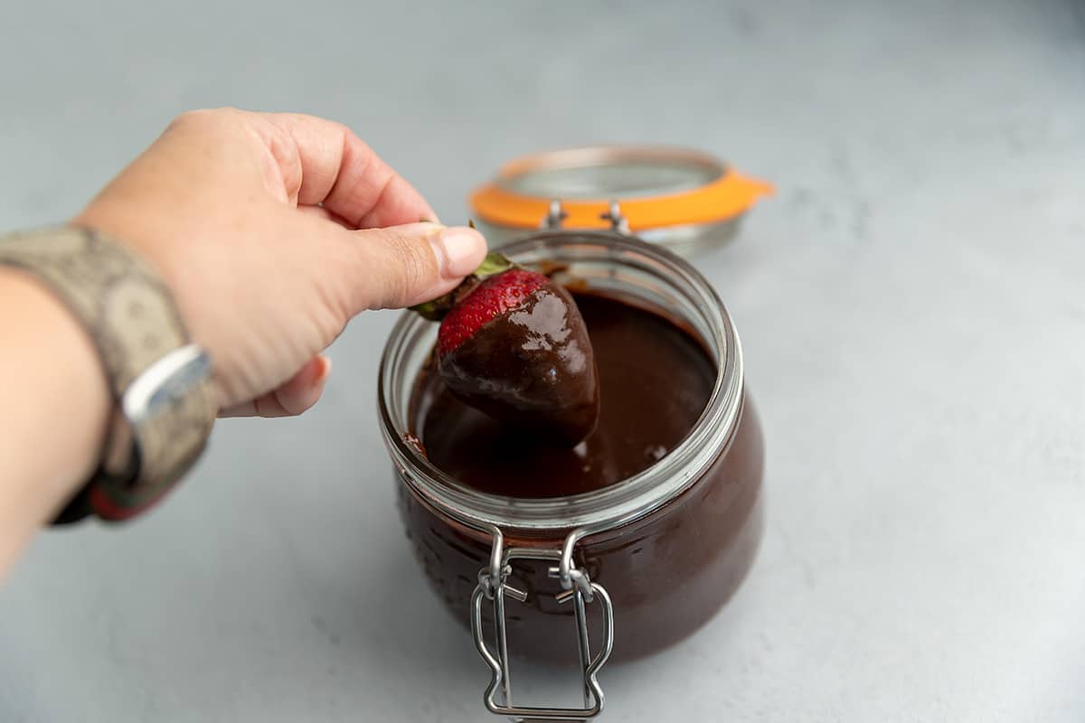 keto hot fudge sauce in a glass jar