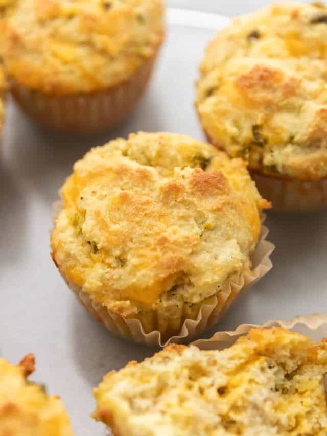 a bunch of jalapeño cheddar muffins on a plate