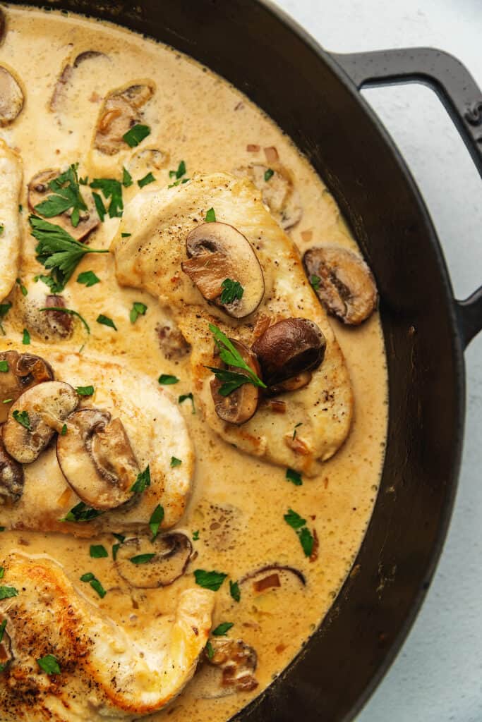 keto chicken marsala in a black skillet