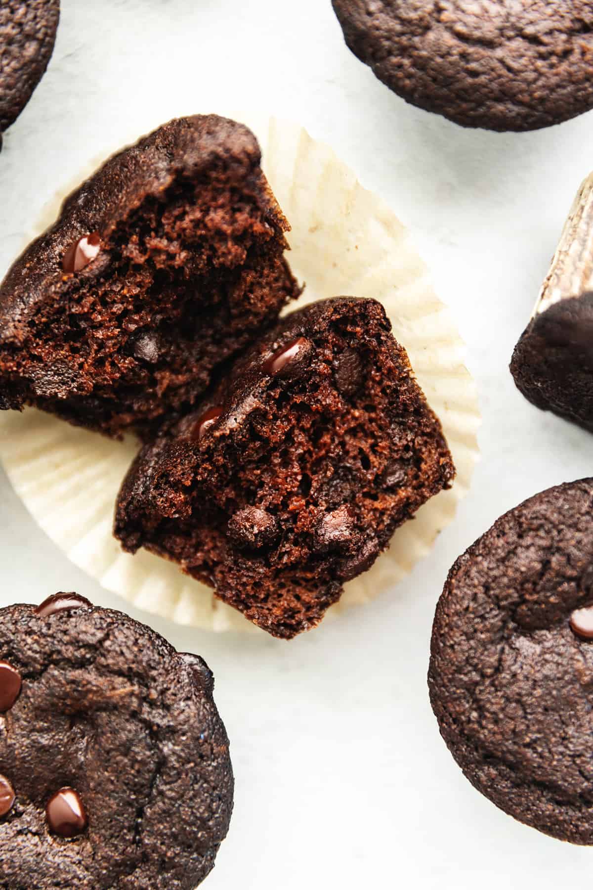 keto fudge chocolate muffins cut in half