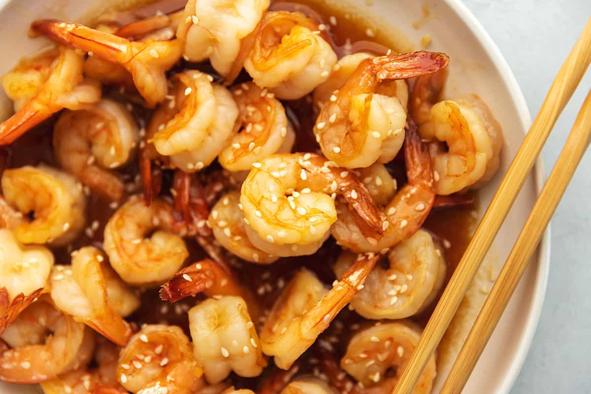 honey garlic shrimp with chop sticks
