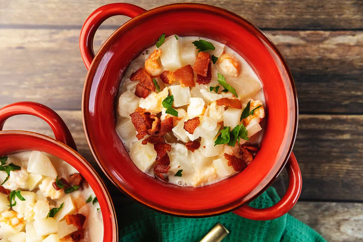 soup with bacon in red bowls