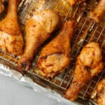 baked chicken legs on a sheet tray