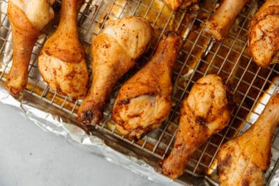 baked chicken legs on a sheet tray