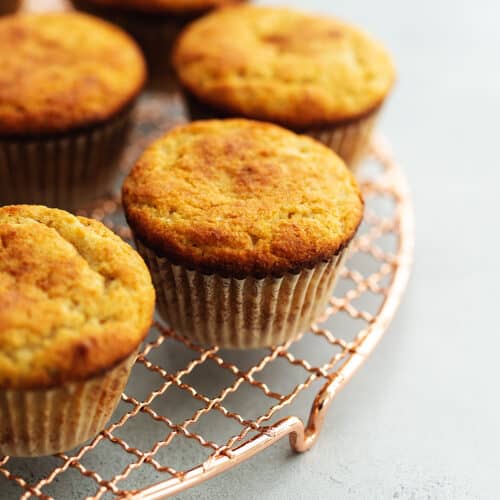 pumpkin spice muffins on a copper cooling rack