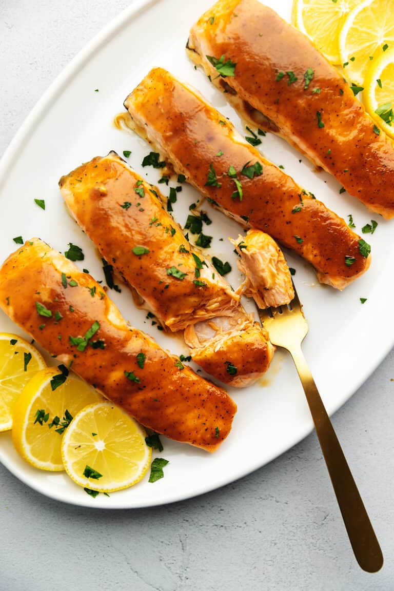 brown sugar glazed salmon on a white platter