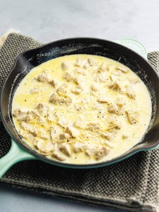 creamy garlic chicken in a skillet