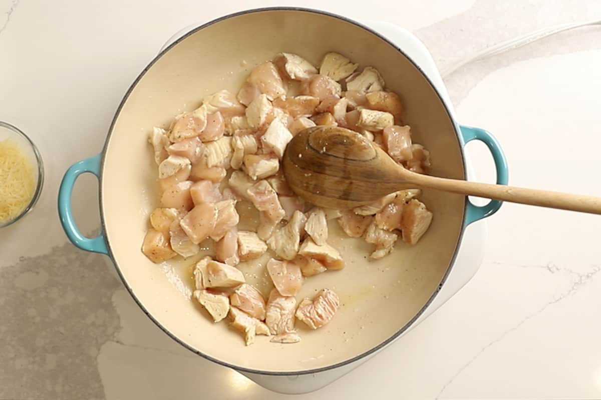 chicken cooking in a skillet