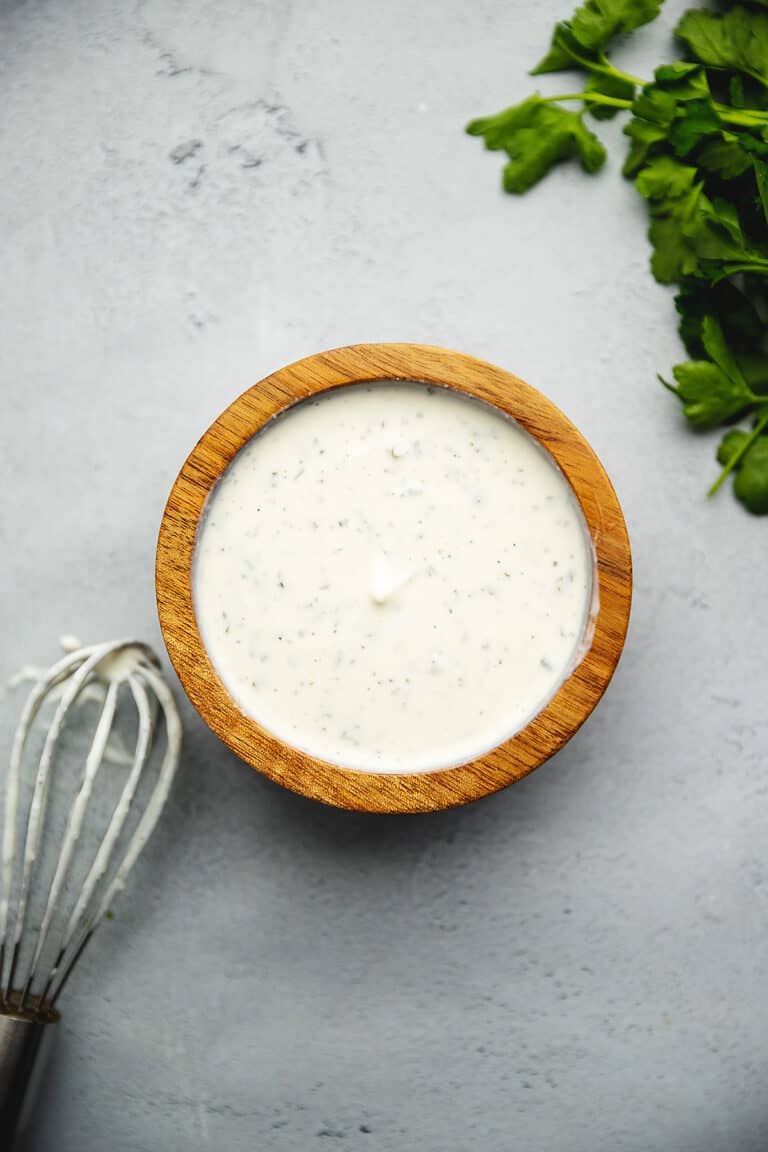 Greek Yogurt dressing in a wooden bowl